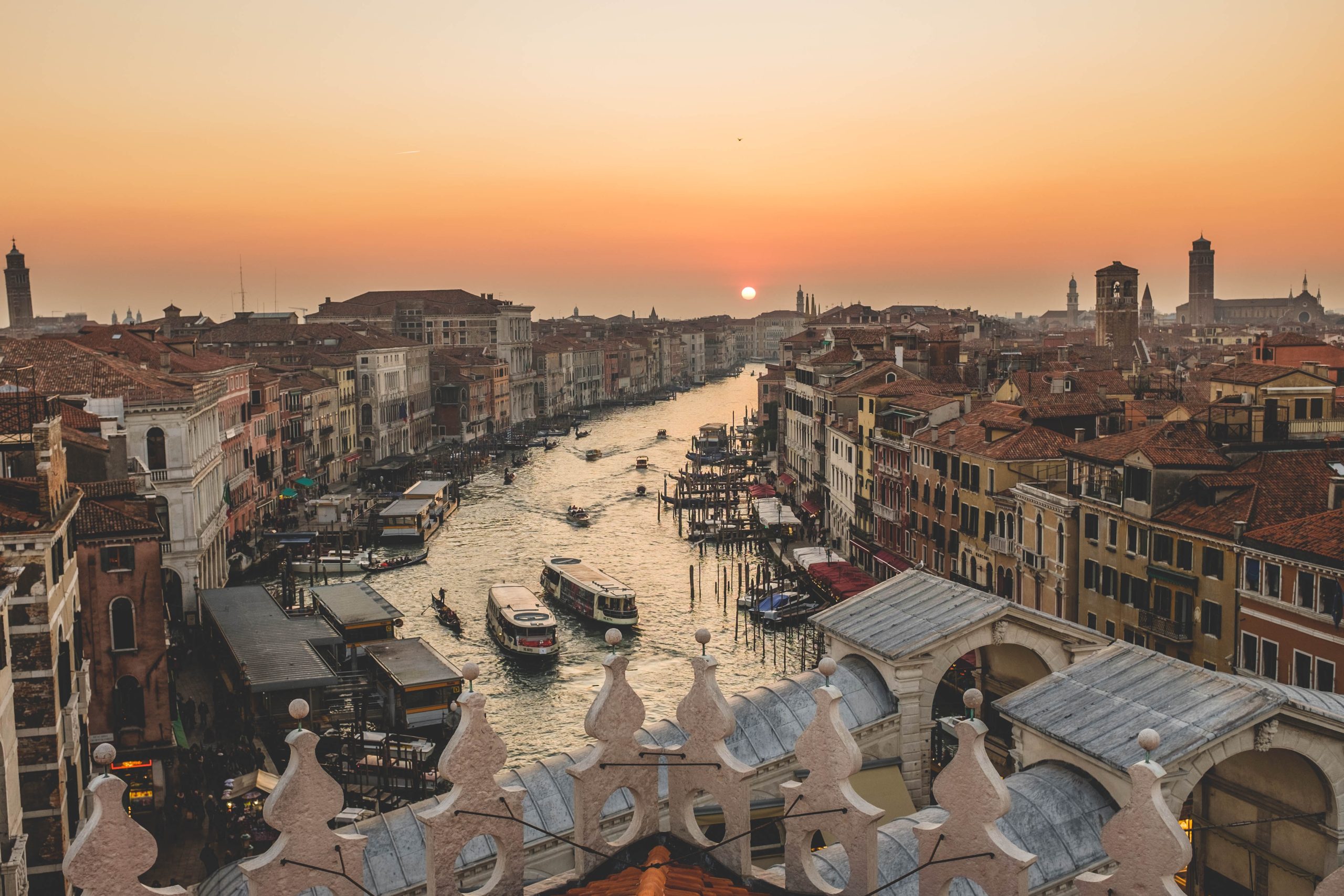 View over the Grand Canal in Venice at sunset, boats on the water